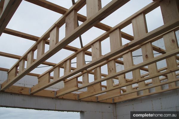 New type of wooden I-beam trusses with slots for communications