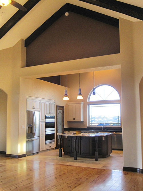 Kitchen with an arched window