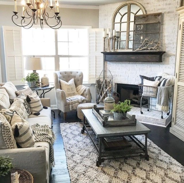 A cozy living room with a corner fireplace