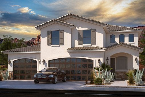 This two-story European house plan's arched front porch matches the garage doors on the front elevation. In the entry, a coat closet makes good use of the space beneath the stairwell, while the heart…