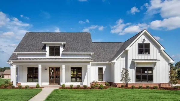 This beautiful single-story home plan has four bedrooms, but there is an option to make an extra room with a bath over the garage, giving you a 5-bedroom home. 