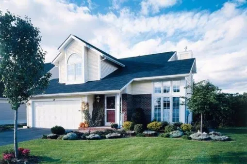  This Canadian house has large arched dormer window, a grand two-story wall of windows and faced with brick, horizontal siding. Steeply pitched roof completes the look of this house. House plan is 40…