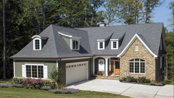 Thanks to the many open living spaces that are easily accessible, this two-story Provence-style house contributes to a relaxed lifestyle. Located on the first floor, the master bedroom overlooks the…